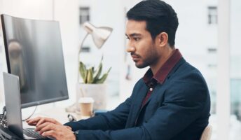 Man using a computer at a desk