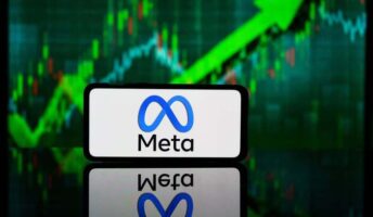 Meta logo in front of green arrow