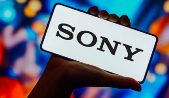 Sony logo on smartphone screen against vibrant electronic background