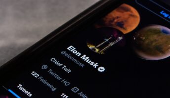 Musk account on phone screen