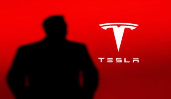 Musk With Tesla Logo
