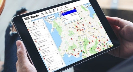 The Verizon Connect Reveal FMS software on an ipad